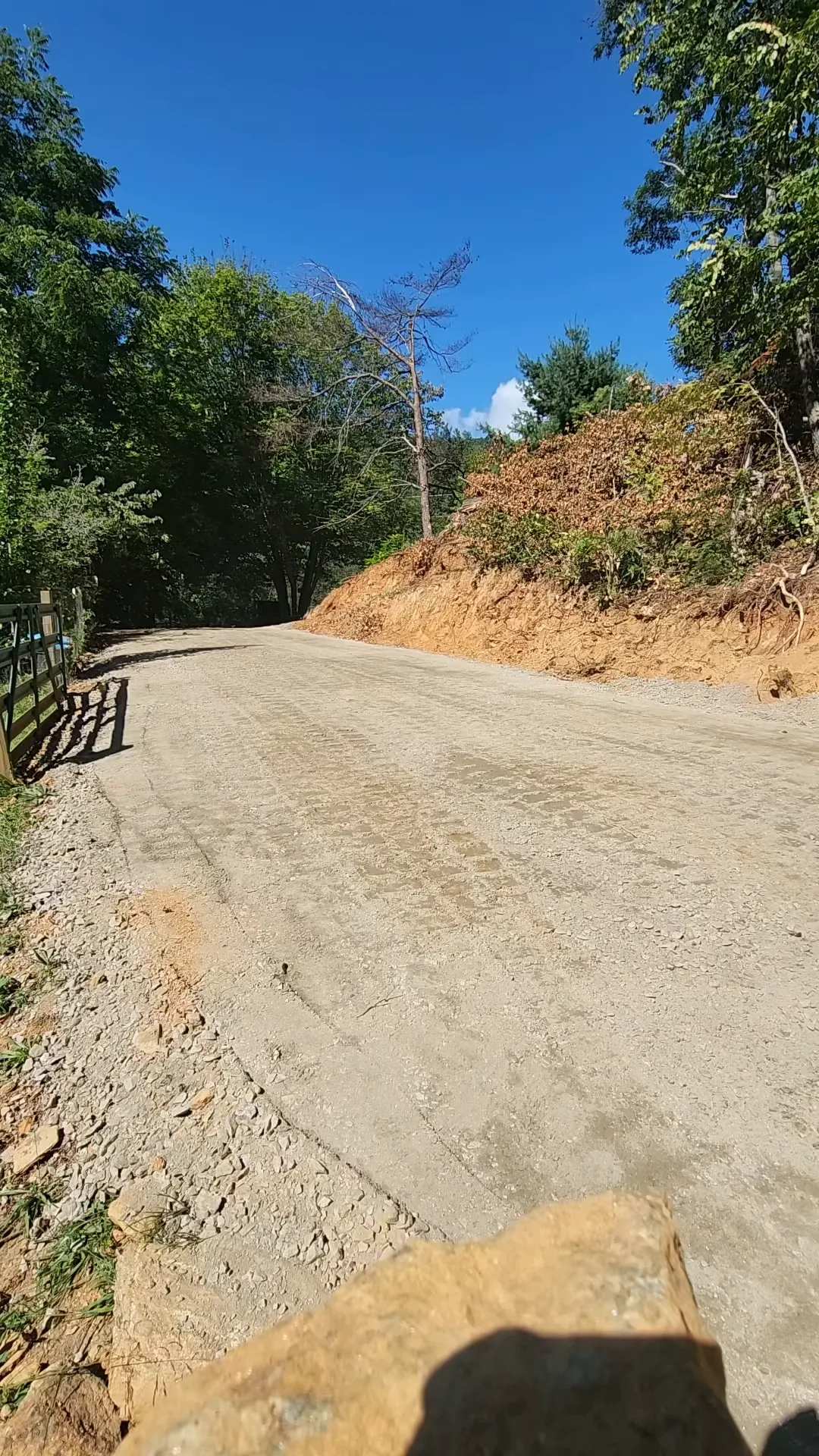 A finished gravel driveway on a mountain grade